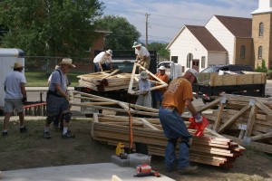 Unloading the roof trusses.