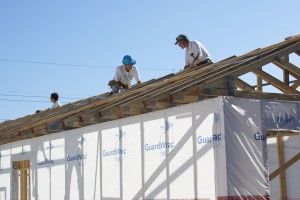 Linda L., Lynn, and Bruce, adjusting the truss peaks