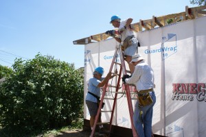 Linda F., Jack, and Lynn, extending and plumbing the north truss tails.