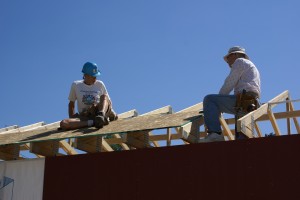 Lynn and Jack installing the roof decking.