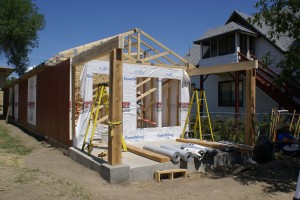 The front porch beams set in place on top of the posts.