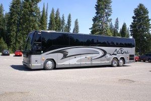 An older Prevost H3-45 operated  by Le Bus.