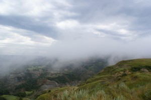 Clouds rolling up out of the river valley to the rim; TRNP NU.