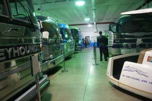 All of the inside buses lined up in a row, oldest to newest, far to near.