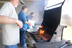 L-to-R Gordy, Marty, and Glenn cooking up the burgers and hotdogs for dinner.