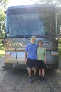 Ed & Betty Burns in front of their motorhome.