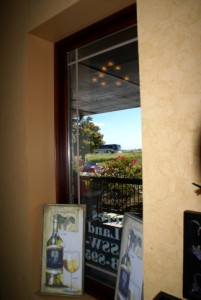 Our coach viewed from a front window of the tasting room.