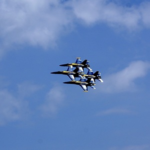Four of the six U. S. Navy Blue Angels in diamond formation.