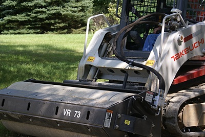 Close up of the compacting roller attachment. This thing shook the whole house!