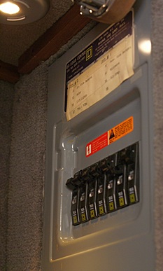 LED puck light in rear bedroom closet to illuminate the inverter sub-panel.