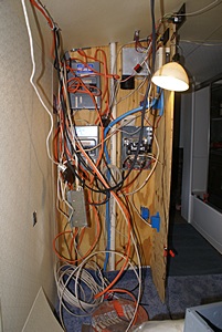 House electrical closet in Butch & Fonda's MC-9 before rewiring.