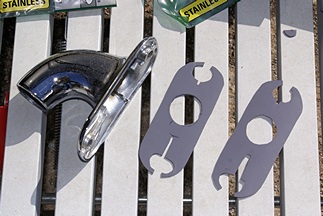 Hand cut gaskets for upper piece of lighted entrance handle on our coach.