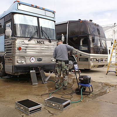 Butch pressure washing the radiators for his fan coil heat exchangers. MC-9 (L) and H3-40 (R).