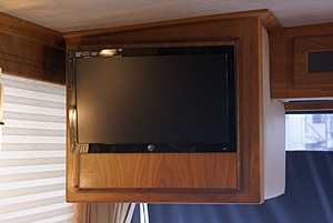 Front flat-panel TV/monitor with cabinet door closed. Look ma, no wires!
