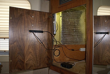 PS rear corner bedroom cabinet with slot in door for TV/monitor wires.
