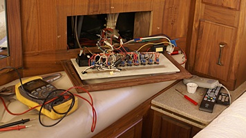 Bus bedroom DS rear corner house systems control panel removed.