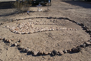 The Bluebird/Wanderlodge logo done in rocks on the desert floor.  These folks were serious about their gathering.