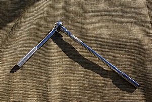 Ten inch ratchet extension with 10mm socket.