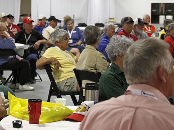 Linda sitting with Val Petkus at the opening staff meeting.