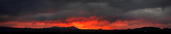 A panorama of the sunset. This is what we saw out the windshields of our bus.