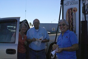 Val, Lou, and Linda having lunch by the fuel pump island at the Circle K in Florence, AZ.