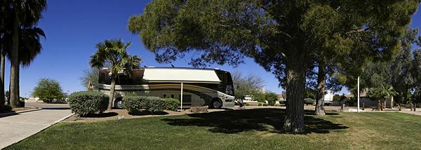 A panorama of our motorcoach parked at RVillage World Headquarters in Arizona City, AZ.