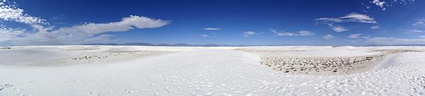 A panoramic photo of part of the White Sands National Monument. The loop road only goes through a small portion of the dunes.