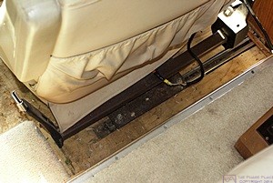 Villa passenger seat in our H3-40 showing inside edge of mounting plate and studs with nus. (Front of coach to the left).