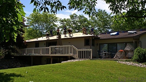 The Apex crew hard at work on the back side of the main roof.