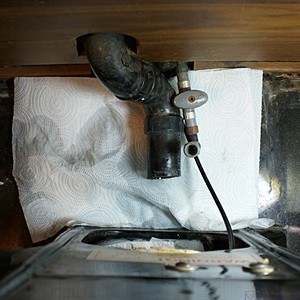 The plumbing at the back of the Microphor toilet in our bus.