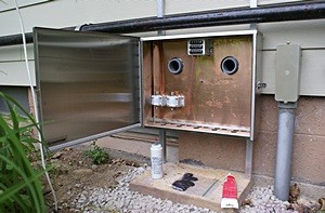 The CEB with the copper backplane installed and the three Morgan lightning arrestors mounted (two lower left, one top center).