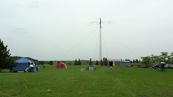 The larger of the two towers is up and secured. It has a 6m beam antenna on top of 20m beam antenna on a common mast with a rotator. We also attached one end of an off-center-fed dipole to this tower.