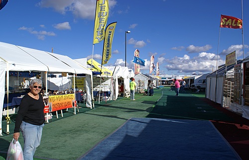 Some of the vendor tents in the Tyson Wells market area on the south side of Kuehn Street.