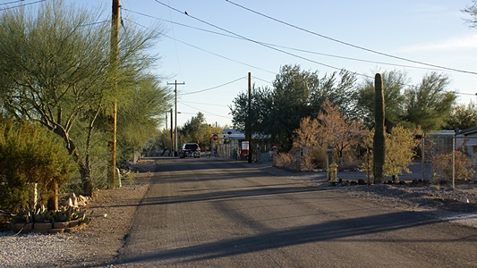 View looking south on Lollipop Ln from the entrance to our compound.