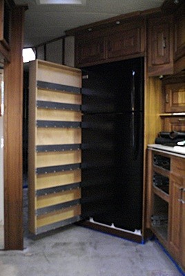 The pantry pulled out with the refrigerator installed.