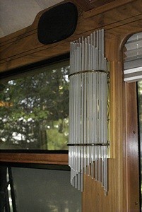 One of the original living room AC light fixtures. These were no doubt high-end fixtures but no longer worked in our remodeled interior.