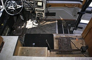 A view of the cockpit of our bus with the old Villa pilot and co-pilot/navigator seats removed. This shot is from the living room looking forward.