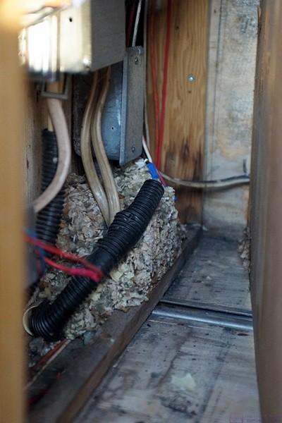 The cavity behind the panel to the right of the co-pilot/navigator seat was apparently a great place for a mouse to build a nest.